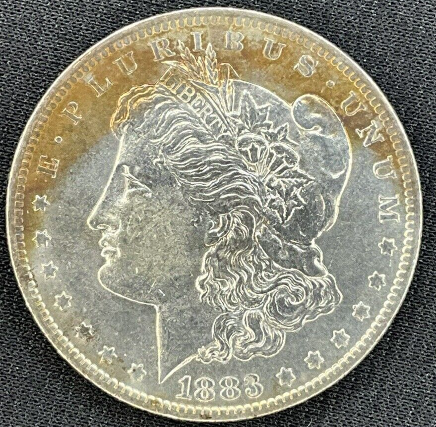 1883 O Morgan Dollar Silver MS $1 Gold & Blue Steel Tone Coin Obverse DIE CRACK
