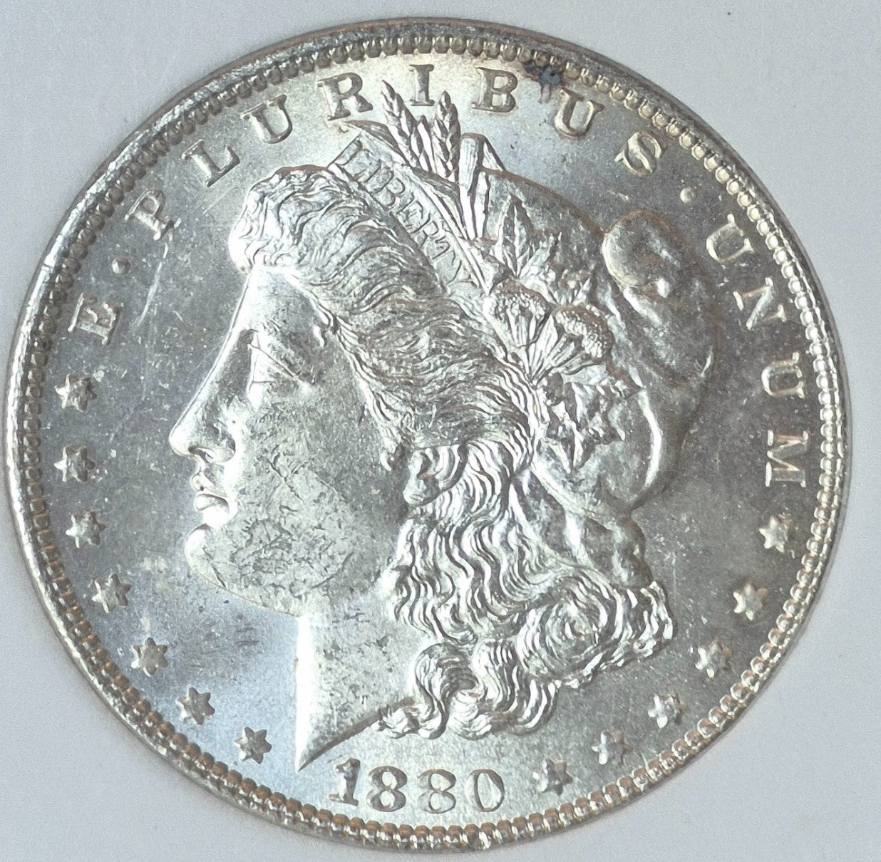 1880 P Morgan 90% Silver Dollar Graded High by National Numismatic Certification