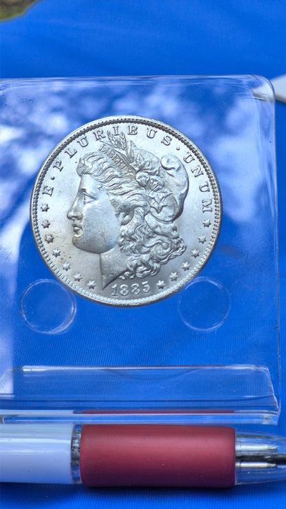 1885-O Morgan 90% Silver Dollar Shiny, Bright, Coin PL MS Features Strong Strike